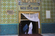 Pilgrims at the Shrine of Hazrat Ali  who was assissinated in 661 This shrine was built here in 1136 on the orders of Seljuk Sultan Sanjar  destroyed by Genghis Khan and rebuilt by Timurid Sultan Hus...