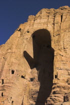 Empty niche in cliffs where the famous carved large Budda once stood 180 foot high before being destroyed by the Taliban in 200