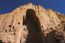 Empty niche in cliffs where the famous carved large Budda once stood 180 foot high before being destroyed by the Taliban in 2001