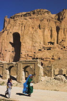Remains of bazzar which was destroyed by the Taliban infront of empty niche where the famous carved Budda once stood  destroyed by the Taliban in 2001