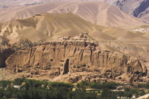 View of Bamiyan valley showing cliffs with empty niche where the famous carved Budda once stood  destroyed by the Taliban in 2001