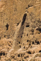 Empty niche in cliffs where the famous carved large Budda once stood 180 foot high before being destroyed by the Taliban in 2001