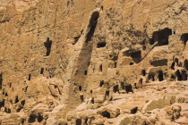 Empty niche in cliffs where the famous carved large Budda once stood 180 foot high before being destroyed by the Taliban in 2001