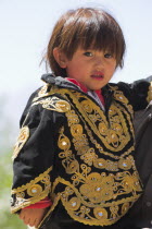 Portrait of young girl in traditional dress.