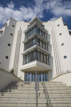 The Warnes modern apartment  development. Exterior view of steps leading to front entrance. The building overlooks the Steyne Gardnes and seafront promenade.