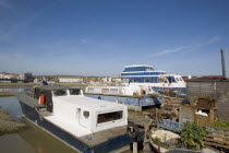 Houseboat moored along the banks of the river adur.