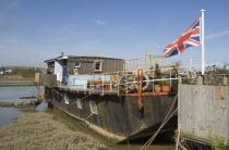 Houseboats moored along the banks of the river adur.