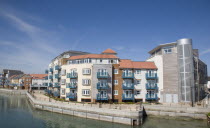 Ropetackle modern housing development apartments on the banks of the river Adur seen from the Norfolk bridge. A regenerated brownfield former industrial area.