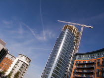 Gunwharf Quays complex. A development of tall modern apartments in process of being built. Angled view.
