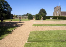 Battle Abbey. Visitors in grounds of partially ruined abbey complex near to the spot that King Harold fell in the 1066 Battle of Hastings