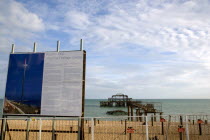 Ruins of the West pier with boards showing plans for the i360 observation tower top be built.European Great Britain Northern Europe UK United Kingdom