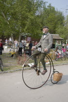 Amberley Working Museum. Veteran Cycle Day Grand Parade. A young boy riding a Penny Farthing bicycle