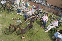 Amberley Working Museum. Veteran Cycle Day with visitors looking at displays of bicycles showing the development of cycle design through the ages