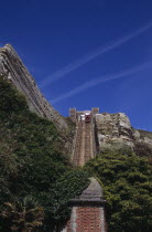 The East Hill Lift. View looking up at the steepest funicular railway in the United Kingdom.Takes passengers from sea level down near the old fishing quarter to the top of East Hill and the edge of Ha...