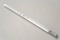 White mercury thermometer showing temperature scale and rising mercury level