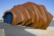 The rusted metal structure of the fish and seafood restaurant the East Beach Cafe designed by Thomas Heatherwick on the promenade