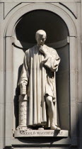 ITALY, Tuscany, Florence, Statue of the politician and writer Niccolo Machiavelli in the Vasari Corridor outside the Uffizi.