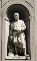 ITALY, Tuscany, Florence, Statue of the sculptor Donatello in the Vasari Corridor outside the Uffizi.