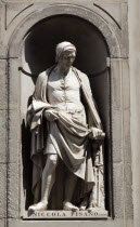 ITALY, Tuscany, Florence, Statue of architect and sculptor Niccola Pisano in the Vasari  Corridor outside the Uffizi.