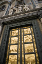 ITALY, Tuscany, Florence, The 15th Century East Doors of the Baptistry of the Cathedral of Santa Maria del Fiore, the Duomo. The panels are by the artist Lorenzo Ghilberti, and were dubbrd the Gate Of...