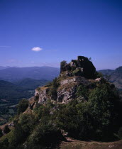 Chateau de Roquefixade   Ruined castle on cliff-top overlooking village of Roquefixade.  Site of refuge for the Cathars during the Albigensian Crusade.