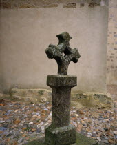 Fanjeaux.  Ancient stone cross outside the thirteenth century Eglise d Notre Dame.  The village had associations with the Cathars.