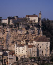 Rocamadour.  Chateau on clifftop with 12th century Basilica of St-Sauveur on lower right and Museum of Sacred Art on left.