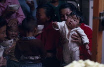 Family attending naming ceremony.