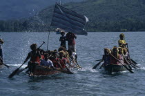 Malaita Province  Lau Lagoon.  Wedding party arriving by canoe.