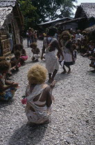 Malaita Province  Lau Lagoon  Foueda Island.  Dance performed to celebrate forthcoming wedding.  Girls wearing multi-strand shell and coral neacklaces.
