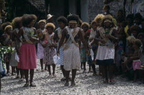 Malaita Province  Lau Lagoon  Foueda Island.  Dance performed to celebrate forthcoming wedding.  Girls wearing multi-strand shell and coral neacklaces.
