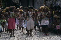 Malaita Province  Lau Lagoon  Foueda Island.  Dance performed to celebrate forthcoming wedding.  Girls wearing multi-strand shell and coral neacklaces.