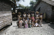 Malaita Province  Lau Lagoon  Foueda Island.  Group portrait of wedding dancers wearing multi-strand shell and coral necklaces.