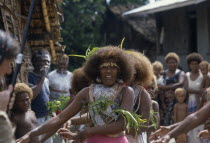 Malaita Province  Lau Lagoon  Foueda Island.  Girls performing wedding dance wearing multi-strand shell and coral necklaces.