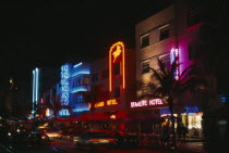 South Beach. Ocean Drive hotel facades illuminated at night