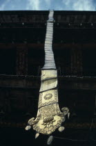 Detail of carved roof hanging.