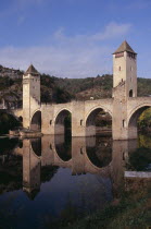 Pont Valentre. Bridge over the River Lot built between 1308 and 1378 with Gothic arches and square towers.