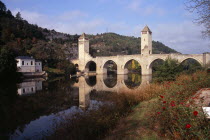 Pont Valentre. Bridge over the River Lot built between 1308 and 1378 with Gothic arches and square towers.