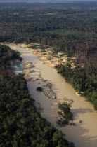 Aerial view over Peixoto River.Now a Garimpo  Gold mine on former Panara territory  showing gold-workings  deforestation and pollution from mercury.