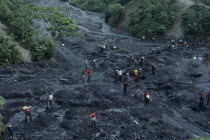 Muzo Emerald Mine in Cordillera Oriental of Colombian Andes. View over guaceros  illegal workers searching in slurry washed down from main mine above  to find emeralds missed by the official syndicate...