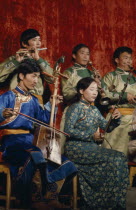 Altai Provincial Orchestra  Altai the provincial capital. Musicians playing various traditional Mongol instruments.East Asia Asian Classic Classical Historical Mongol Uls Older