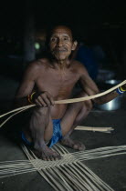 Makuna head man Ignacio starting to make a woven cane basket.Tukano  Makuna Indian North Western Amazonia American Colombian Columbia Hispanic Indegent Latin America Latino Male Men Guy South America...
