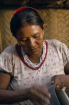 Barasana woman  Paulina  the headman Boscos sister  making clay pot.Her death has marked the virtual extinction of pottery-making amongst the Barasana. Tukano sedentary Indian tribe North Western Amaz...