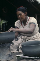 Barasana woman Paulina making clay cooking pot from grey river clay. Tukano sedentary Indian tribe North Western Amazonia American Colombian Columbia Female Women Girl Lady Hispanic Indegent Latin Ame...