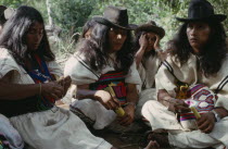 Ika widow and sons at mortuary rites being performed in Guatapuri valley for her husband  an Ika leader murdered by right-wing paramilitaries linked to the Colombian Army.Arhuaco Aruaco indigenous tr...