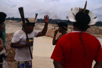 Garimpo  goldmine on former Panara territory.  Headman Aka declaims against actions of garimpeiros resulting in the environmental                     ruin of Panara homelands.Garimpeiro small scale p...