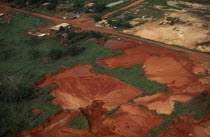 Aerial view over landscape with severe damage/pollution from gold mining operations clearly visible over former Panara territory. Garimpeiros have displaced the Indians  previously known as Kreen-Akro...