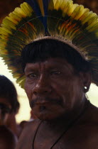 Portrait of respected Panara elder  Krekon  wearing crown or head-dress of feathers.Formally known as Kreen-Akrore  Krenhakarore  Krenakore  Krenakarore  Amazon American Brasil Brazilian Indegent Kre...