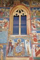 Frescoes on outside wall above entrance  Voronet Monastery  near Gura Humorului