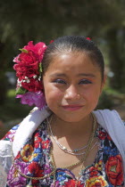 Young Mexican girl wearing traditional costume